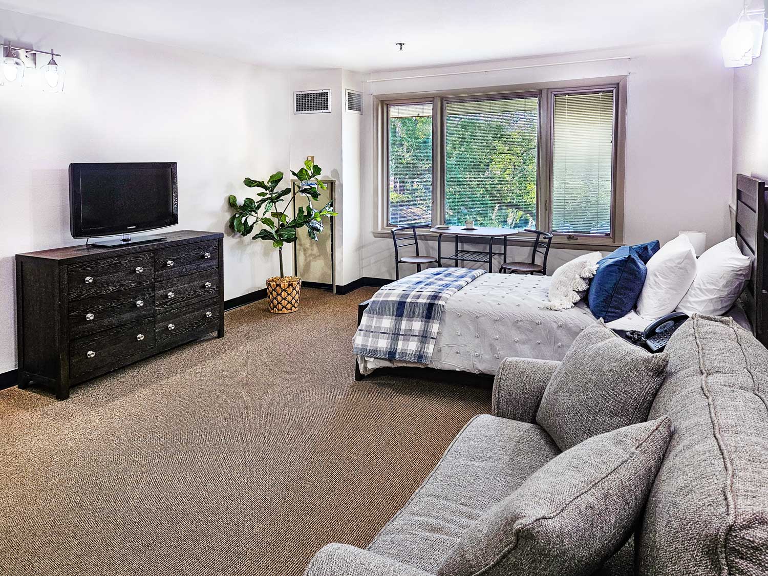 Resident Living Space at Weinberg Village Room photo with view of lake