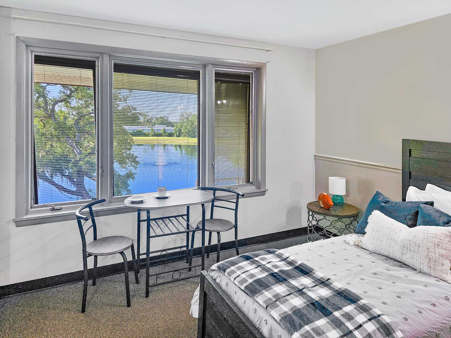 Resident Living Space at Weinberg Village Room photo with view of lake
